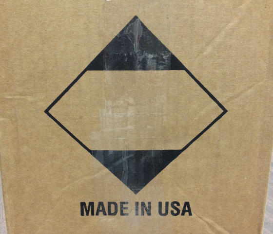 Box with disinfectant warning label
